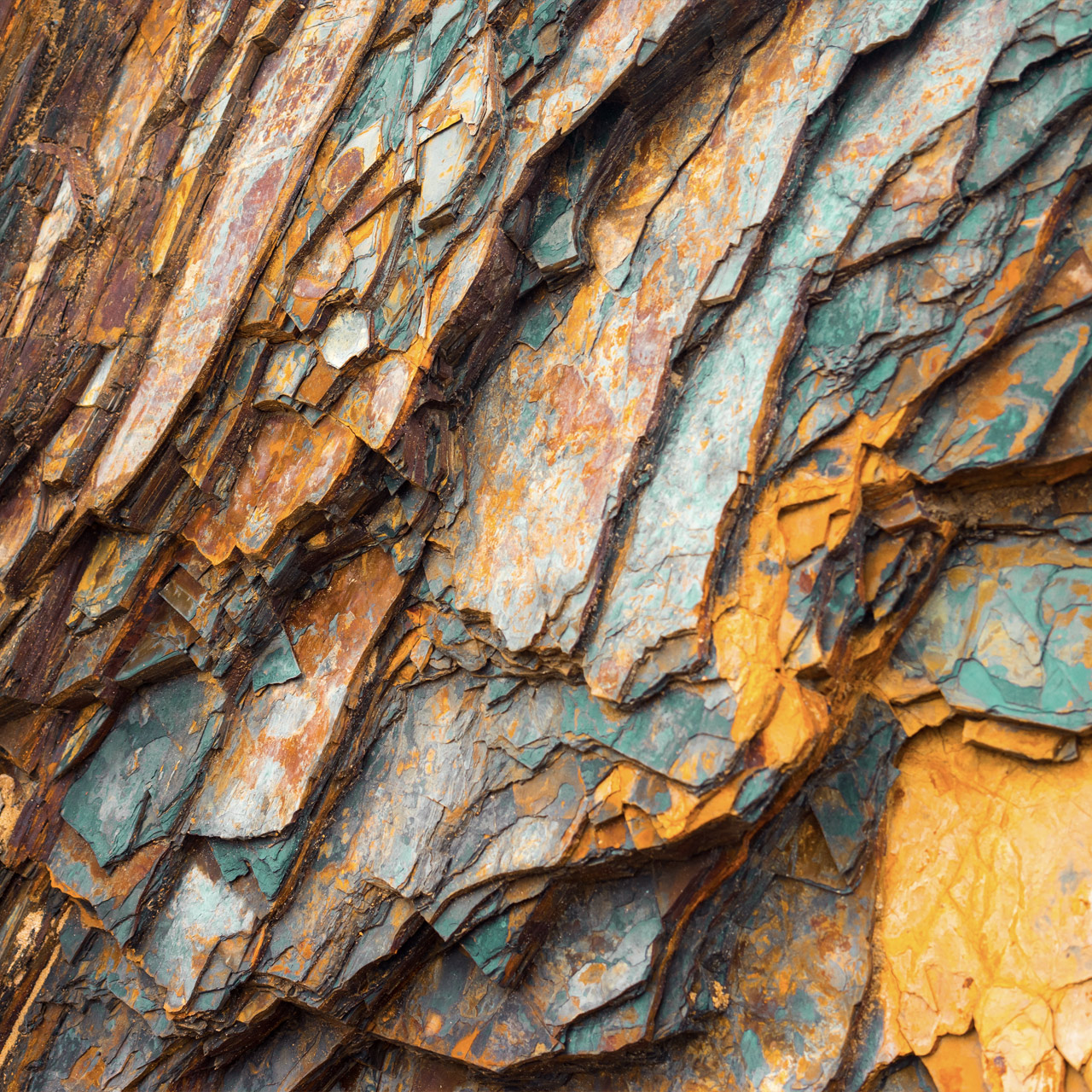 Rock layers , a colorful formation of rocks stacked over time.